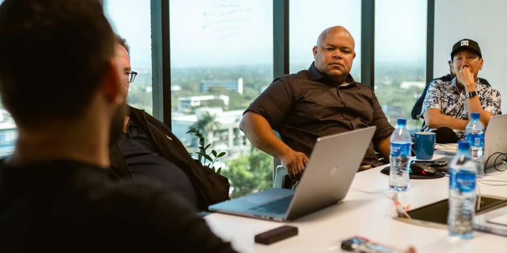 Isaac Ovid in strategic session evaluating digital strategy and AI tools